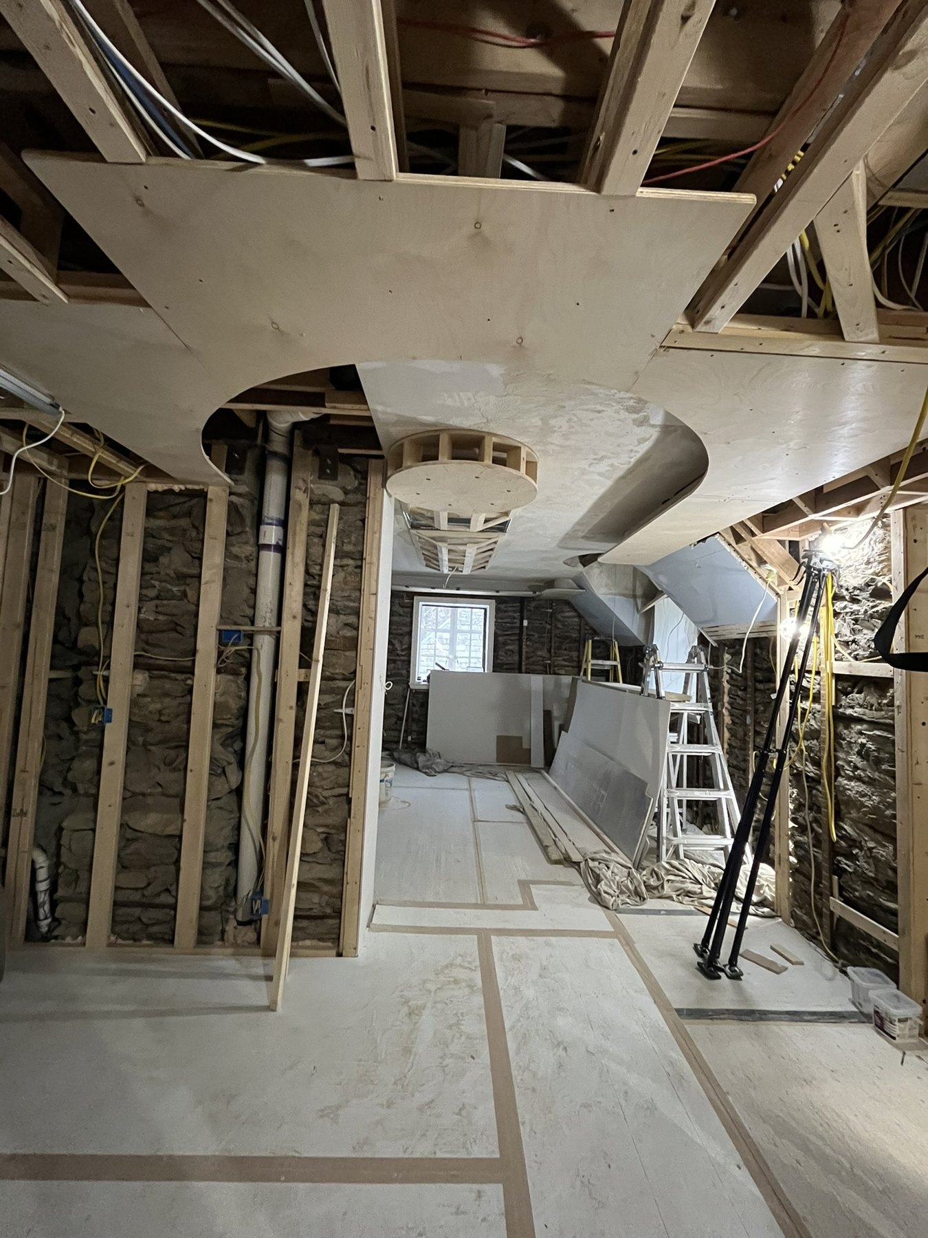 Cylindrical ceiling framing installed in the studio